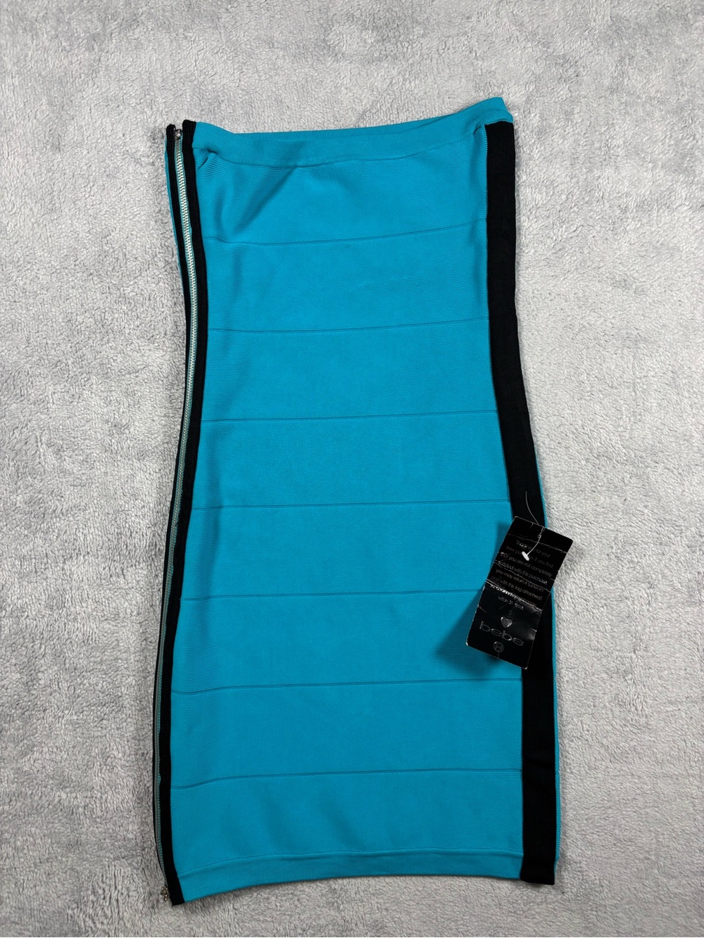 Vintage Y2K Bebe blue bodycon midi banded skirt with black stripes.